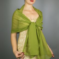 A very elegant chiffon shawl for your wedding party or evening dress. Made of luxury chiff, slightly sparkles on the sun or light. Color: olive green ( other colors are available ) Size : 200 cm x 45 cm  You can use it as a wrap, shawl or stola. WE have matching bags in our Etsy Shop! WE accept credit cards! Winter Wedding Shawl, Bridal Capelet, Bridesmaid Wrap, Olive Wedding, Luxury Green, Bridal Shrug, Shawl Wedding, Bridesmaid Shawl, Customized Bridesmaid Gifts