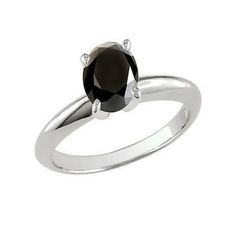 a black diamond ring on a white background