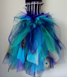 a dress made out of tulle and feathers