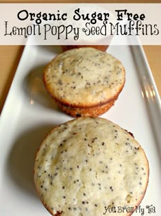 two poppy seed muffins on a white plate with the words organic sugar free lemon poppy seed muffins