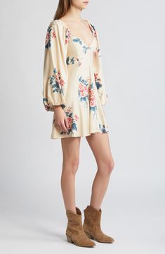 Love to twirl in this airy mini designed in an enchanting print and framed by billowy sleeves. Sweetheart neck Long sleeves Smocked back Lined 100% viscose Machine wash, tumble dry Imported Cream Floral Dress, Francescas Dresses, Billowy Sleeves, Faux Shearling Jacket, Buy Leggings, Buy Sweaters, Fashion Organization, Daytime Dresses, Fashion Now