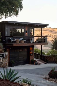 a large house with a balcony on top of it