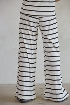 Get ready for your next boat day in the Sailor Striped Ribbed Wide Leg Pants! These cute and comfy pants features a horizontal striped design, high rise fit, elastic waistband, wide leg, and side pockets . Pair with the matching Sailor Striped Ribbed Tank to complete the look! Details 63% Polyester, 37% Cotton Soft stretchy material Hand wash cold / Lay flat to dry Champagne Collection, Baby Pjs, Boat Day, Sailor Stripes, Newborn Gown, The Sailor, Comfy Pants, Womens Robes, Ribbed Tank