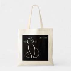 Minimalist white cat on black add name tote bag Customizable Eco-friendly Black Bags, Black Rectangular Bag With Cat Print, Black Everyday Bags With Cat Print, Black Everyday Bag With Cat Print, Everyday Black Bag With Cat Print, Eco-friendly Rectangular Bag With Cat Design, Black Cat Design Tote Bag, Black Tote Bag With Cat Design, Gift Black Bag With Cat Print