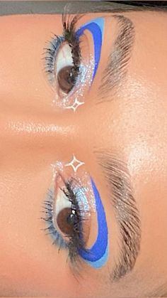 Space Eyeliner Looks, Blue Lightning Eye Makeup, Blue Beetle Makeup, Graphic Eyeliner Makeup Looks, Blue Liner Looks, Blue And White Graphic Liner, Purple And Blue Eyeliner, Blue Graphic Eye Makeup, Cool Makeup Looks Creative Eyeliner