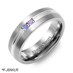 a men's wedding band with two purple sapphire stones inlayed into the center