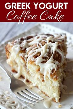 a slice of coffee cake on a white plate with a fork in front of it