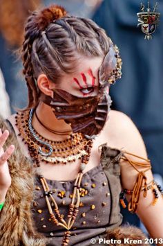 The face covering #amwriting Braids Female, Warrior Female, Dystopia Rising, Wasteland Warrior, Leather Face, Post Apocalyptic Fashion, Spiritual Warrior, Warrior Women, Apocalyptic Fashion