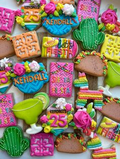 some decorated cookies are sitting on a table