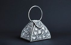 Mini bag inspired by a mirror ball. An accessory-like mini bag that looks like a jewelry box to carry around Swarovski rhinestone jets  give off a chic light. It's the perfect size to store essential women's items such as small wallets, cards, handkerchiefs and lips. It is recommended not only for formal occasions but also for accenting simple outfits (for example, simple shirts and jeans). size: 14cm×11cm×11cm handleφ10cm.  material: Swarovski Jet Rhinestone, Beads, Sequins wrapping:Any item is Embroidered Products, Mirror Ball, Large Crystal, Top Handle Bags, Cute Purses, Simple Shirts, Evening Clutch Bag, Large Crystals, Mini Bags