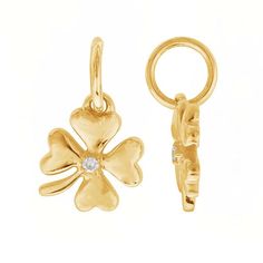 This 14-karat yellow gold four-leaf clover charm is set with one .005-ct. round white diamond (SI-I1 grade/G,H,I color; .005-ct. TW) in the center of the clover. The charm is flat on the back and brightly finished on both sides. String it on a chain, connect it to bracelet, attach an ear wire, or use it as a jewelry tag or accent in a larger design. Four Leaf Clover Jewelry, Medallion Jewelry, Four Leaf Clover Charm, Clover Jewelry, Clover Design, Clover Charm, Jewelry Tags, Four Leaves, Four Leaf