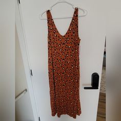 Spft Cotton Blended Tank Dress With Pockets. Bin 10 Casual Orange Printed Midi Dress, Casual Orange Printed Dresses, Casual Orange Maxi Dress For Brunch, Orange Casual Midi Dress For Day Out, Casual Orange Midi Dress For Day Out, Casual Brown Maxi Dress For Brunch, Casual Brown Maxi Sundress, Casual Orange Maxi Dress, Sleeveless Tiger Print Dress For Spring