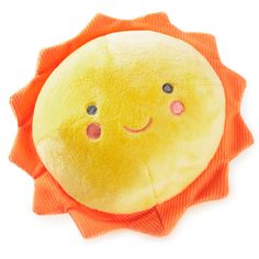 a yellow and orange stuffed animal with two eyes