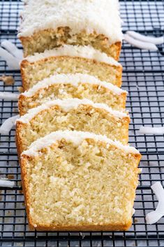 slices of banana bread with white icing on a cooling rack, ready to be eaten