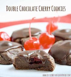 chocolate cherry cookies on a plate with cherries