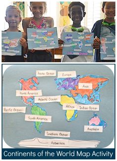 children holding up maps with words on them