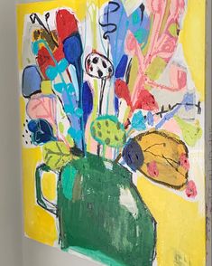 a painting with flowers in a green vase