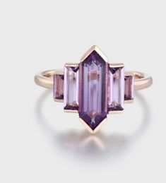 Hexagon cut Purple Amethyst ring Unique Rose gold engagement ring Baguette cut ring Bezel set ring Vintage Bridal wedding anniversary ring *Main stone: Amethyst *Stone Shape: Hexagon Cut *Stone Size: 10x5mm *Stone Color: Purple *Second Stone: Amethyst *Stone Shape: Baguette *Stone Color: Purple ☆Band Width: Approx. 1.5mm ☆Band Thickness: Approx. 1.2mm ☆Height of Stone setting: 5.3 mm Jewelry Type: Designer Ring Metal: 925 Sterling Silver Method: Handmade Personalization: Possible Occasion: commitment Style: Art Deco Ring Size: We make rings from US 4 to US 10. (If you need smaller or bigger ring size, please ask me to resize) Country of Manufacture: India It's easy to create jewelry that's perfect for you. Change the materials to suit your style. I am happy to quote you the price. IMPORTAN Purple Engagement Rings, Unique Rose Gold Engagement Ring, Engagement Ring Baguette, Baguette Cut Ring, Unique Engagement Rings Rose Gold, Baguette Engagement Ring, Bezel Set Engagement Ring, Amethyst Ring Engagement, Purple Amethyst Ring