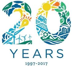 the 20th anniversary logo with windmills, trees and sun in blue and green colors