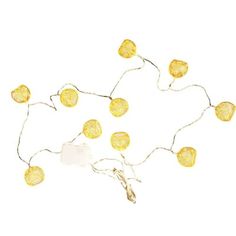 yellow string lights on white background