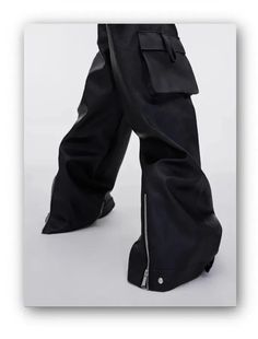 A statement piece for those who embrace bold, oversized street style. These black faux leather cargo pants feature a baggy fit and dramatic silhouette, blending luxury and edge in one unmistakable look. Essential Features: Premium Faux Leather: High-quality material that feels as good as it looks Baggy Fit: Relaxed, oversized cut for ultimate comfort and style Cargo Design: Functional pockets with a sleek streetwear vibe Luxury Streetwear: For those who push boundaries in fashion Limited Edition Black Faux Leather Cargo Pants With Pockets, Black Leather Bottoms With Cargo Pockets, Black Leather Cargo Pants With Cargo Pockets, Black Utility Leather Pants For Streetwear, Black Leather Cargo Pants With Side Pockets, Fall Streetwear Faux Leather Pants, Faux Leather Pants For Streetwear In Fall, Faux Leather Pants For Fall Streetwear, Fall Faux Leather Streetwear Pants