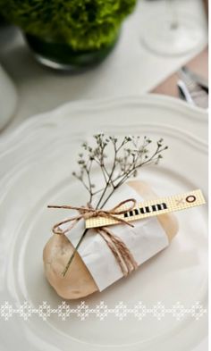 a white plate topped with a piece of paper