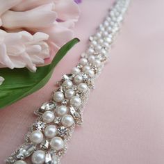 Elegant Pearl Embellished Sashes For Party, Elegant Crystal Wedding Sashes, Elegant Beaded Silver Sashes, Elegant Silver Beaded Sash, Elegant Embellished Sashes, Elegant Beaded Adjustable Bridal Belt, Elegant Pearl Embellished Bridal Belt For Wedding, Elegant Pearl Embellished Bridal Belt, Elegant Beaded Sashes For Wedding