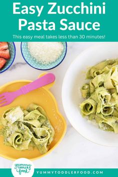 an easy zucchini pasta sauce in a yellow bowl next to two bowls with strawberries