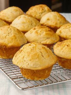 several muffins cooling on a wire rack