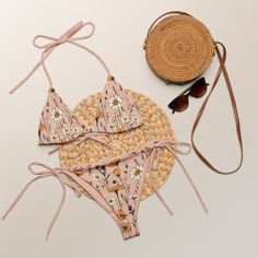 Stunning triangle beige bikini set with meadow flowers and beige lining is available in sizes up to 6XL. This bikini is made from recycled material.  Please check the sizing chart between the listing photos. In case of any questions feel free to message me. Item is custom-made per order. The bikini set was designed by me and it's made by Printful in their production facilities in Europe or the USA. Item is sent from the production facility nearest to you. Item description: - fabric composition i Triangle Beachwear Swimwear For Vacation, Triangle Beachwear Swimwear For Beach Season, Beige Beachwear Swimwear For Poolside, Triangle Swimwear For Summer Vacation, Triangle Swimwear For Beach Season Vacation, Triangle Swimwear For Beach Vacation, Triangle Swimwear For Beach Party, Triangle Swimwear For Beach Party Season, Beige Beachwear For Poolside