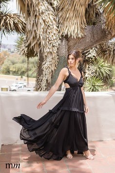 The Veda Maxi Dress is the perfect balance of elegance and fun. Made from stunning black chiffon, this dress features delicate ruffle straps with side cut outs and a flirty ruffle tiered skirt. Pair with heels and a bold lip for a fun night out. Cut Out Maxi Dress, Bold Lip, Tiered Ruffle Skirt, Maxi Dress Black