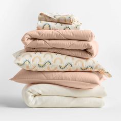 four pillows stacked on top of each other