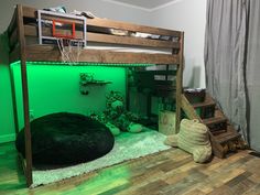 a loft bed with a basketball hoop on the top and green lighting in the bottom