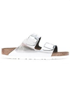 Shop Birkenstock metallic buckled sliders Modern Silver Sandals With Buckle Closure, Silver Slides With Leather Footbed, Silver Slides With Leather Footbed For Summer, Modern Silver Slip-on Sandals, Silver Open Toe Slides With Cushioned Footbed, Silver Round Toe Slides With Buckle Closure, Silver Open Toe Slides With Buckle Closure, Silver Open Toe Slides With Buckle, Silver Leather Slides For Summer