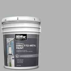 a bucket of behr ultra stain and primer in one on a white background