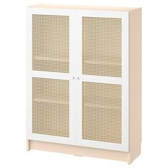 a white cabinet with wicker doors on the front and side panels in light beige