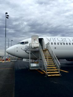 an airplane with stairs leading up to it