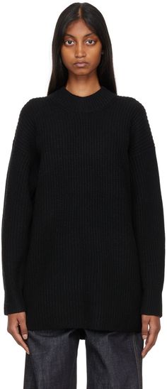 RWS-certified knit wool sweater. Rib knit crewneck and cuffs. Supplier color: Black Black Wool Sweater For Workwear, Black Wool Sweater For Work, Black Turtleneck Sweater With Ribbed Cuffs, Black Cashmere Turtleneck Sweater, Black Wool Sweater With Ribbed Collar, Black Wool Sweater With Ribbed Cuffs, Classic Black Sweater With Ribbed Cuffs, Black Merino Wool Sweater With Ribbed Collar, Black Crew Neck Sweater For Work