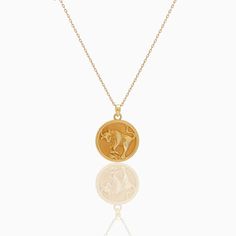 Taurus Zodiac Coin Pendant - Classic. Crafted for you to flaunt your star sign, this necklace goes with every outfit and will give a hint of sentiment wrapped in luxury to your style. The Diamond Bezel around the Gold Coin blends into a delicate yet beautifully detailed piece. Coins 5. 4 grams of 18k yellow gold and 0. 44 ct natural diamonds Yellow Gold Zodiac Sign Medallion Necklace, 14k Gold Zodiac Medallion Necklace, 14k Gold Zodiac Sign Pendant Necklace, Yellow Gold Zodiac Pendant Necklace, Yellow Gold Zodiac Sign Amulet Necklace, Luxury Sterling Silver Zodiac Sign Necklaces, Yellow Gold Zodiac Amulet Necklace, Luxury Zodiac Sign Necklaces, Zodiac Sign Necklace Fine Jewelry Gift