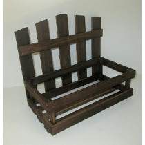 an old wooden bench sitting on top of a white table