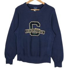 Vintage 90s Georgetown University Hoyas crewneck sweatshirt in navy blue colour. Pullover sweater with embroidered logo on the front. Still in good condition. SEE THE PICTURES FOR MORE DETAILS. CONDITION : 9/10 MEASUREMENT Pit : 20.5 inch Length : 28 inch Shoulder : 16 inch Arm Length : 27 inch Size On Tag : S Recommended Size : S PAYMENT We accept PayPal only. The item will be ship 3-5 days once the payment has been made. NORMAL SHIPPING FEDEX USUALLY AROUND 7-21 DAYS BEFORE REACH THE DESTINATI Navy Top With Embroidered Logo For College, College Crew Sweatshirt With Embroidered Logo, Vintage Crew Sweater With Embroidered Logo, Blue Crew Neck Sweatshirt With Embroidered Logo, Crew Neck Sweatshirt With Embroidered Logo, Navy Long Sleeve Sweatshirt With Embroidered Logo, Varsity Crew Neck Sweater With Embroidered Logo, Collegiate Crew Neck Sweatshirt With Embroidered Graphics, Crew Neck Streetwear Sweater With Embroidered Logo