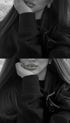 a woman with long hair posing for a black and white photo, her hands on her face