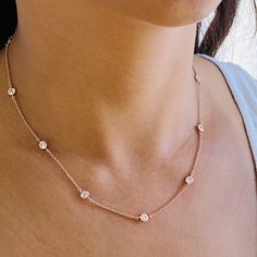 "Our stunning cubic zirconia necklace is the perfect to layer up with your favorite everyday pieces. Featuring eye-catching shiny circular cubic zirconia discs that are stationary evenly spread out on a delicate chain. DETAILS & SIZE *The listing is for one cubic zirconia necklace *Available in 14kt gold,rose gold plating over sterling silver or sterling silver chain and findings *Adjustable length choker will have a 1\" extension chain Lengths: 16\" + 2\" extender *Every purchase comes in a Tan Round Cubic Zirconia Diamond Necklace, Rose Gold Solitaire Necklace With Single Cut Cubic Zirconia, Rose Gold Cubic Zirconia Round Necklace, Dainty Rose Gold Cubic Zirconia Diamond Necklace, Rose Gold Cubic Zirconia Necklace, Cubic Zirconia Necklace With Adjustable Chain And Round Cut, Cubic Zirconia Necklace With Adjustable Chain, Cubic Zirconia Diamond Necklace With Delicate Chain, Rose Gold Round Diamond Necklace With Clavicle Chain