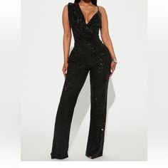 Sequin Jumpsuit Sleeveless Adjustable Spaghetti Strap Front Drape Detail Lined Invisible Back Zipper Wide Leg Stretch Shell 95% Polyester 5% Spandex Lining 100% Polyester Elegant Stretch Strapless Jumpsuit For Party, Elegant Strapless V-neck Jumpsuit For Party, Sequin Strapless Sleeveless Jumpsuit For Party, Sequined Strapless Jumpsuit For Party Season, Sequin Strapless Jumpsuit For Party, Party Season Sequined Strapless Jumpsuit, Glamorous Strapless Sleeveless Jumpsuit For Party Season, Elegant Strapless Jumpsuit With Sequins For Night Out, Fitted V-neck Jumpsuits And Rompers For Party