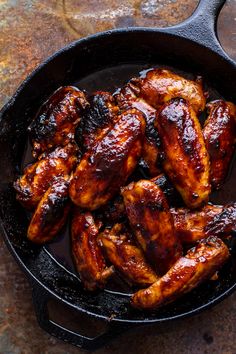 chicken wings in a cast iron skillet