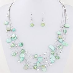 Season:All Seasons; Gender:Women's; Gemstone:Crystal; What's in the box:Necklace,Earrings; Style:Bohemian,Boho,Elegant,Ladies; Necklace Length:16 to 17.75 Inches; Jewelry Type:Drop Earrings,Layered Necklace,Necklace / Earrings; Occasion:Party,Daily; Material:Crystal,Shell; Color:Green,White,Blue,Red,Black; Design:Layered,Floating; Front page:Jewelry; Product Dimensions:0.0000.0000.000; Shipping Weight:0.033; Package Dimensions:27.0009.0000.500; Net Weight:0.04; Listing Date:07/07/2016; Package type:Plastic bag; Base Categories:Apparel  Accessories,Jewelry,Jewelry Sets; Special selected products:COD; products source:supplier Multi Necklace, Crystal Jewelry Sets, Women's Jewelry Sets, Cheap Jewelry, Crystal Drop Earrings, Shell Earrings, Layered Necklace, Bridal Jewelry Sets, Elegant Earrings