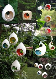 several different types of bird feeders hanging from trees in various shapes and sizes, all designed to look like birds