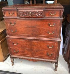 an old wooden dresser with many drawers