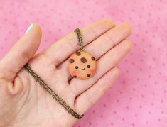 Hi CutiePie,  I'm kawaii cookie necklace. I'm pendant created from polymer clay without using any molds and completely handmade. I can be a funny gift for people of all ages. I'll always cheers You up and will bring a smile on your face.My dimensions are:Length 1" ( or 2.5 cm. )Width 1" ( or 2.5 cm. )Chain length: 20" ( 50 cm. )But I can also be made as earrings, a brooch or a keychain.My dimensions as keychain:Length 1" ( or 2.5 cm. )Width 1" ( or 2.5 cm. )My dimensions as earrings:Length 0.8" Cute Handmade Polymer Clay Necklaces, Cute Resin Necklaces For Gifts, Handmade Cute Polymer Clay Necklaces, Cute Personalized Polymer Clay Jewelry, Kawaii Pendant Jewelry As A Gift, Cute Pink Polymer Clay Necklace, Handmade Kawaii Polymer Clay Jewelry, Cookie Necklace, Handmade Polymer Clay Kawaii Jewelry