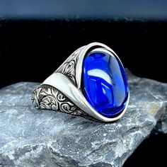 Men Sapphire Stone Silver Ring , Hand Engraved Ring, Silver Handmade Blue Sapphire Ring, Father Day Gift , 925k Sterling Silver Ring  ★Item Details * Gender : Male / Female * Material : 925K Sterling Silver * Total weight : 16  Grams * Gemstone : Sapphire Stone ✔ Ready to Ship in 1-2 Business Days .. ✔ Shipped to the Worldwide 1-5 business days with free shipping... ✔ The product will be sent to you with a handmade wooden box to avoid any damage during shipping... ✔ Visit our store, browse other Blue Oval Signet Ring For Promise, Blue Oval Signet Promise Ring, Oval Blue Intaglio Ring, Blue Polished Signet Ring As Gift, Blue Polished Finish Signet Ring As Gift, Blue Signet Ring With Polished Finish For Gift, Blue Signet Ring With Polished Finish As Gift, Blue Intaglio Ring, Blue Sterling Silver Engraved Signet Ring